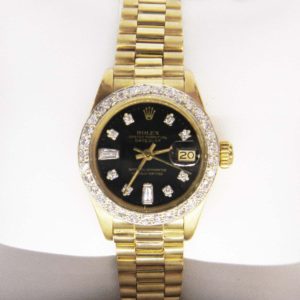 Gold and Diamond Rolex with Black Oyster Face